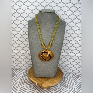 Elegant orange with black with green cord Pendant Necklace